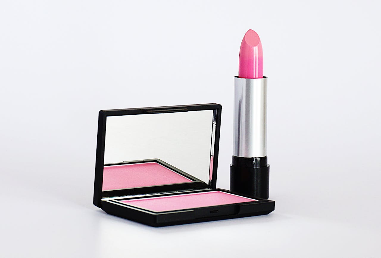 hero-gallery-01 Stylish pink lipstick and blush makeup set on a white background, perfect for beauty and cosmetics branding.